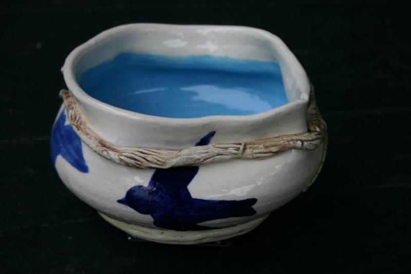 spouted vase with vines view 2