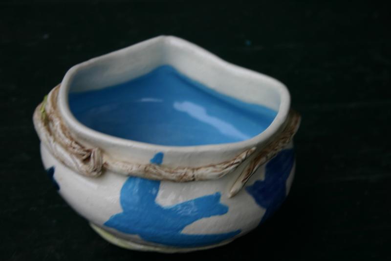 spouted vase with vines view 3